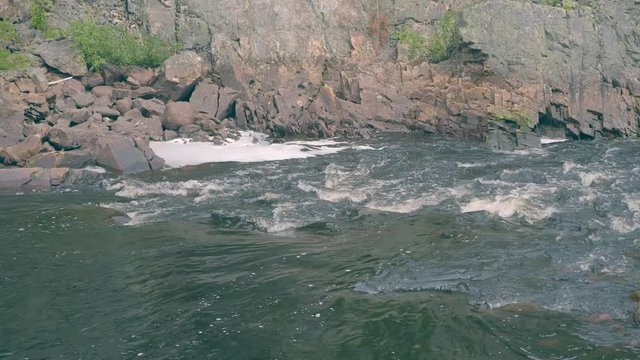 River flowing through the beautiful landscape of Dalarna, in Sweden.