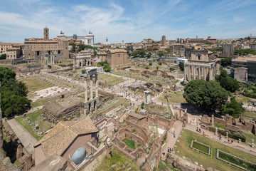 Fototapeta na wymiar Elevated view towards the arch of Septimius Severus and the church of Santa Luce e Martina in the forum, Rome