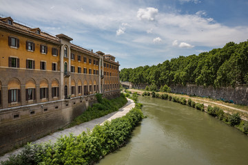 Building overlooking the Tiber River in the Trastevere district of Rome
