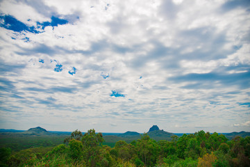 Obraz na płótnie Canvas Glass House Mountains nearby Brisbane city in Queensland, Australia. Australia is a continent located in the south part of the earth.