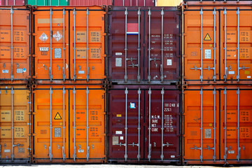A group of shipping containers stacked together.