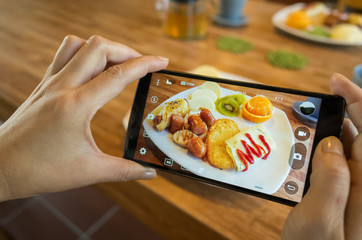 taking photo at breakfast