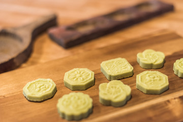 green mooncake on table