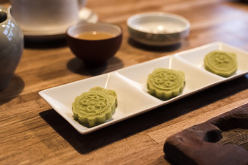 green mooncake on table