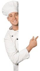 Chef pointing at a blank sign