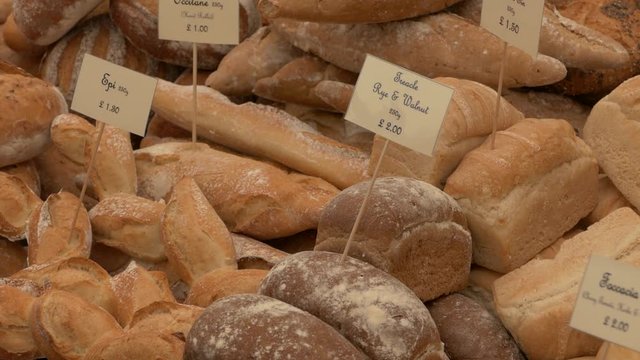 Various kind of bread / Mixed Bread filmed in a bakery in England with prices in GPB / British Pound
