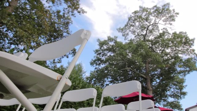 White folding chairs trees dynamic