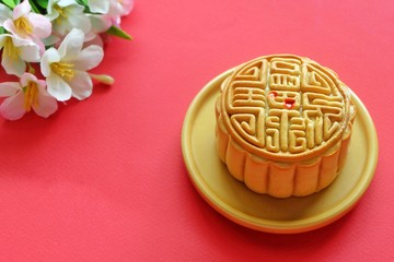 Mooncake on red background. Mid-Autumn Festival. Traditional Chinese Festival