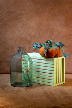 Still life with handmade pumpkins from felted wool for the celebration of Halloween