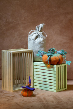 Still life with handmade pumpkins from felted wool for the celebration of Halloween