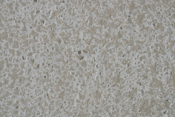 Gray cement wall texture, uneven surface with pattern, abstract background  
