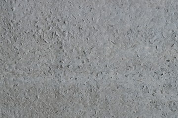 Gray cement wall texture, uneven surface with pattern, abstract background  
