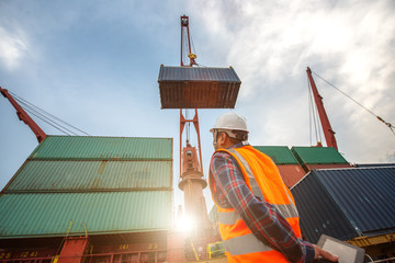 the loading and discharging opertion container ship vessel in port takes control by stevedore and...
