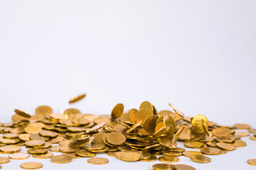 Movement of falling gold coin, flying coin, rain money with soft shadow on white background, business and financial wealth and take profit concept.