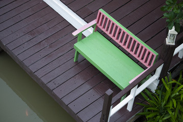 Wood bench with bright color at the pier