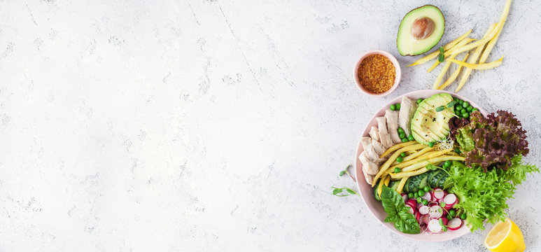 Salad With Chicken Breast With Asparagus Beans, Radish, Avocado, Cucumber And Lettuce On White Background