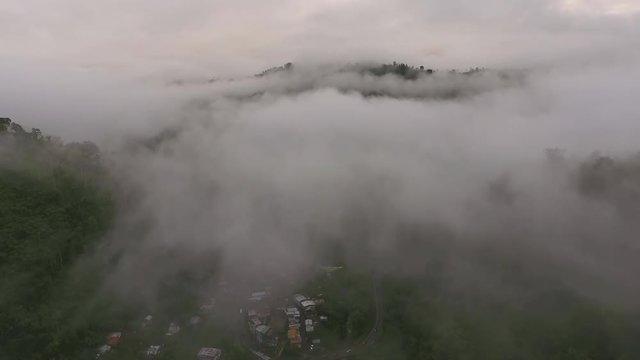 Flying over the Toachi Valley, Ecuador at dawn. Towards Union de Toachi village with the main road from Aloag to Santo Domingo behind. On the Pacific slopes of the Andes in Ecuador