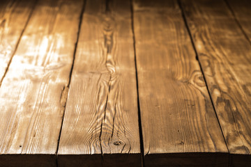 An old board with knots and chips. Wood. Background. Selective focus