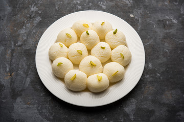 Indian Rasgulla or Rosogulla dessert/sweet served in a bowl. selective focus
