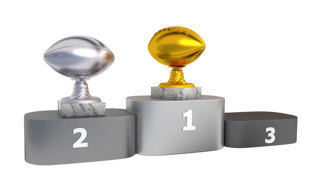 American Football Gold Silver and Bronze Trophies with Marble Bases Appear on Podium