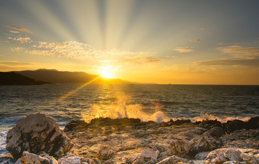 Sun rays at Albania beach, Ksamil, sunset light