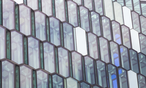Windows of a modern office building in the form of honeycomb