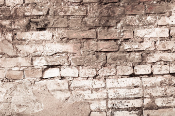 Grunge brick wall. Old construction stones.