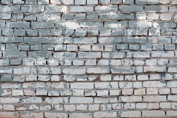 Grunge brick wall. Old construction stones.