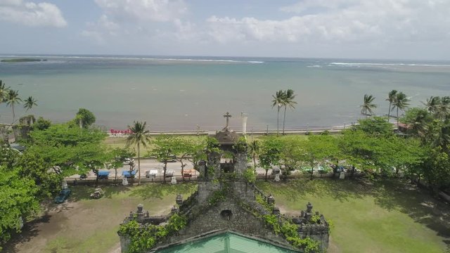 Old, ancient St Joseph church in the city of Barcelona, Sorsogon, Philippines. Church in the Spanish style on the coast near sea.