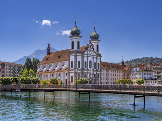 Fototapeta na wymiar Jesuit Church on the River Reuss in Lucerne, Switzerland