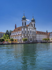 Fototapeta na wymiar Jesuit Church on the River Reuss in Lucerne, Switzerland