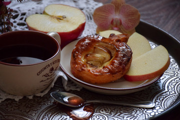 cup of coffee and cake on table