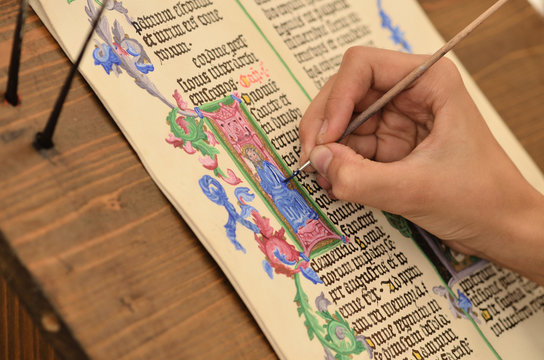 Fototapeta Close-up of hand of medieval manuscript scribe - calligraphy