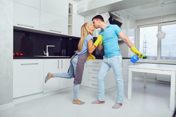 House cleaning. A young couple is cleaning an apartment.