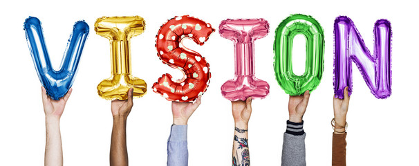 Colorful alphabet helium balloons forming the text vision