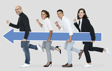 Diverse business people holding a blue arrow
