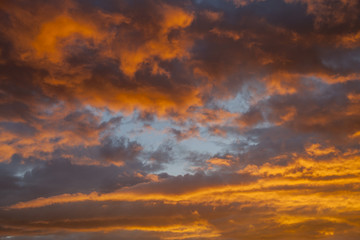 Gloomy sky after the rain in sunlight at sunset, Sky After sunset -Red background