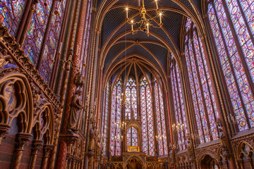 Fototapeta na wymiar Stained glass windows inside the Sainte Chapelle a royal Medieval chapel in Paris, France