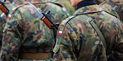 Polish patch flag on soldiers arm. Poland military unifor