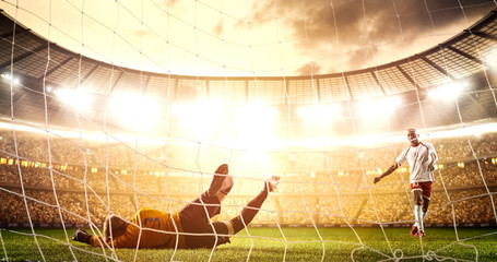 Intense soccer moment in front of the goal on the professional soccer stadium.