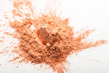 Crumbled Powder make up on white background