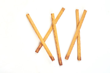 biscuit sticks with sweet filling on white background.
