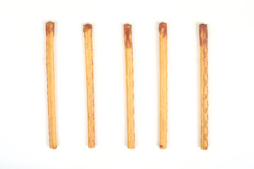 biscuit sticks with sweet filling on white background.