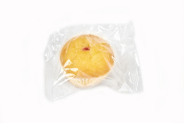 muffins packed in transparent packaging, on a white background.