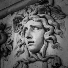 Head with wreath detail of the ancient sculpture