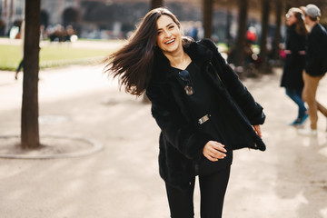 Fototapeta premium girl walking aroung the streets and the city of Paris