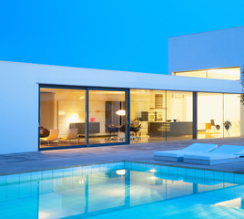 Fototapeta na wymiar Luxury villa with swimming pool. Modern villa with pool.