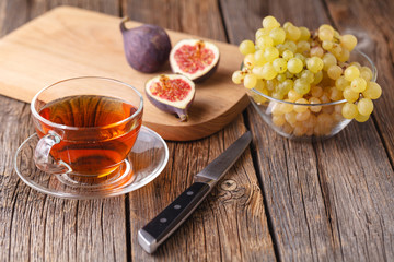 morning cup of tea with fruit, healthy breakfast