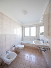 Retro bathroom with tiles and window