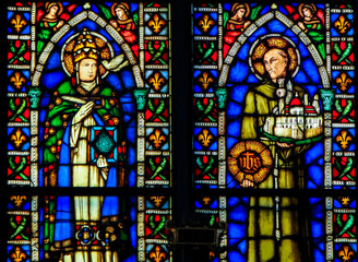 Fototapeta na wymiar Catholic Saints - Stained Glass in Santa Croce, Italy